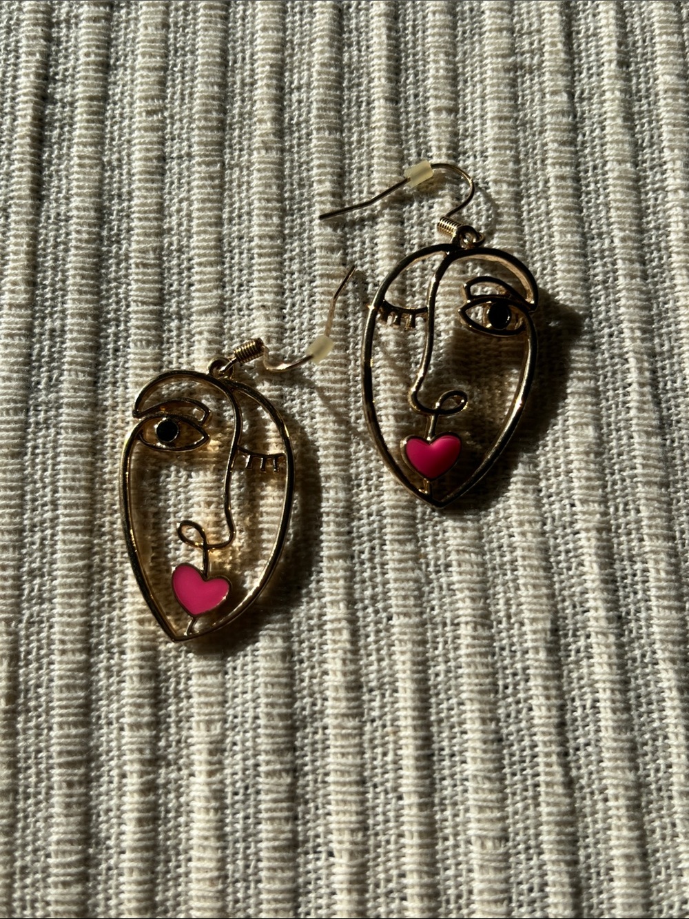 Gold-Finish Abstract Face Earrings with Pink Heart Accent